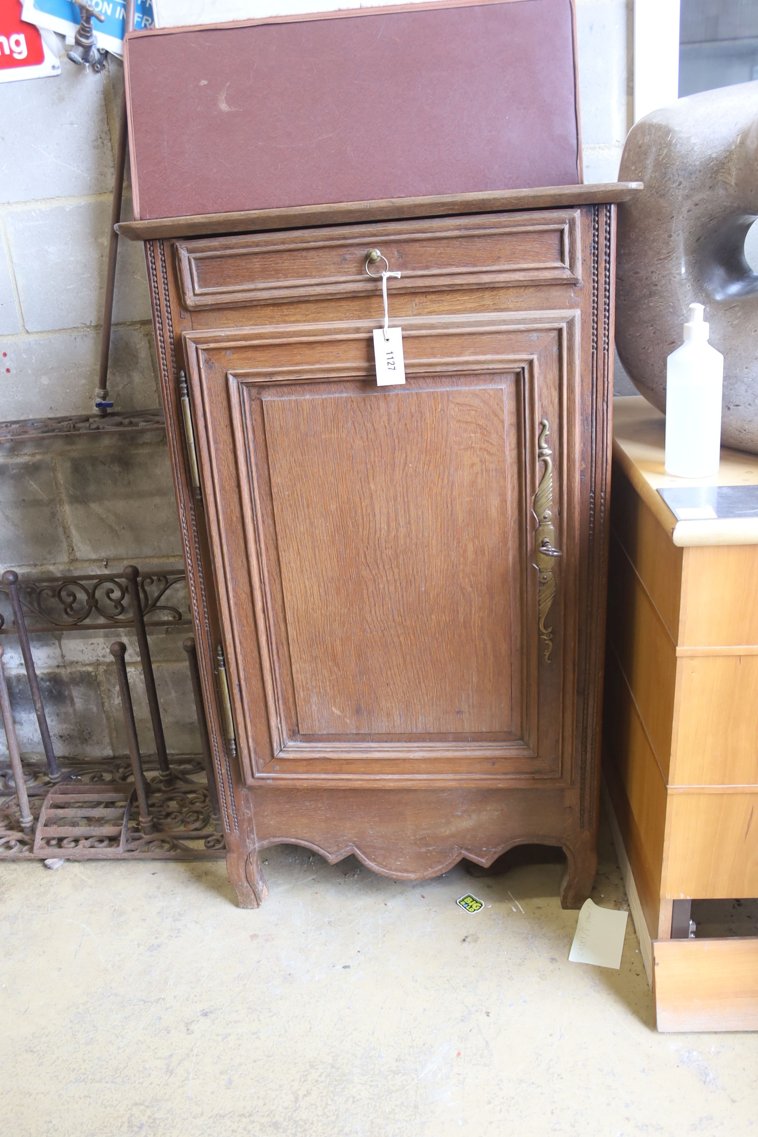 A 19th century Normandy oak side cabinet, width 66cm, depth 49cm, height 109cm